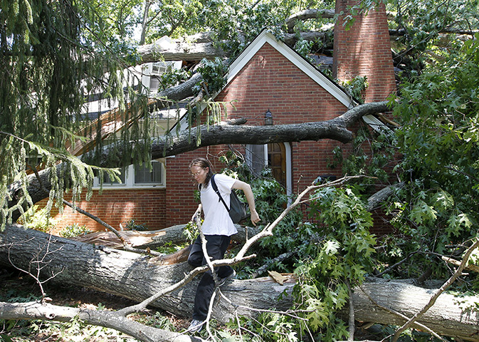 US storms: A tree that fell across a home located in Charlottesville, Virginia