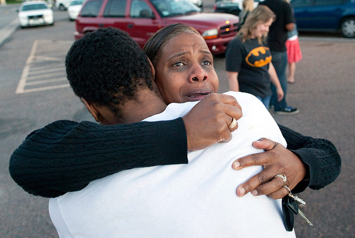 Denver shooting: Shamecca Davis hugs her son Isaiah Bow