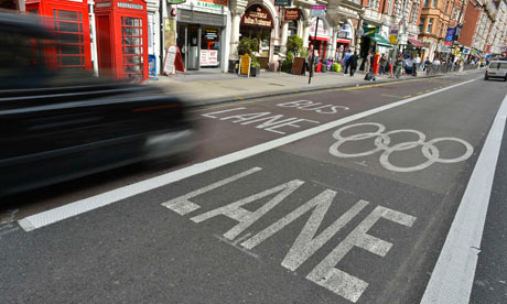 Vehicles drive past Olympic and bus lane 