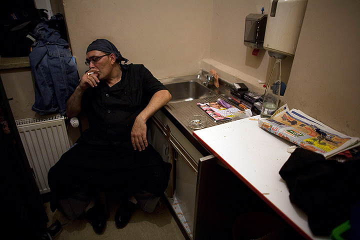 From the agencies: Jose Manuel Abel smokes a cigarette during a break 