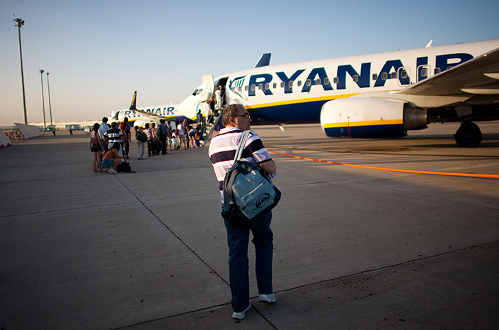From the agencies: Jose Manuel Abel walks to his Ryanair flight