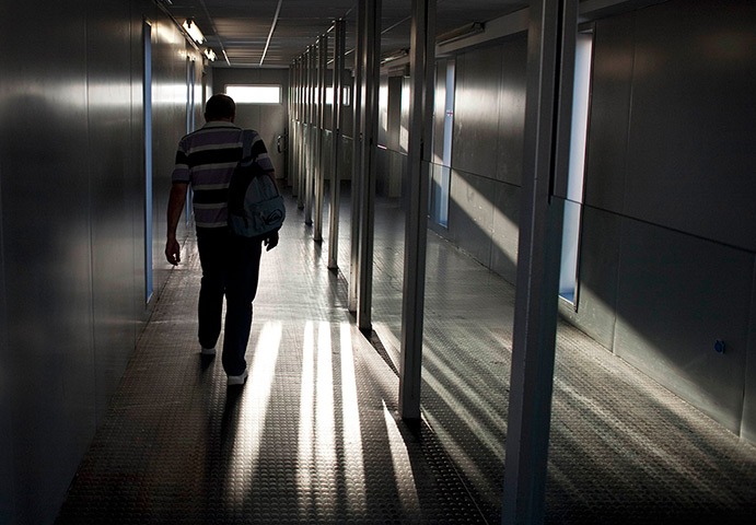 From the agencies: Jose Manuel Abel walks to catch a plane at San Pablo airport in Seville