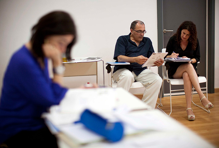 From the agencies: Jose Manuel Abel sits next to German language class in Chipiona