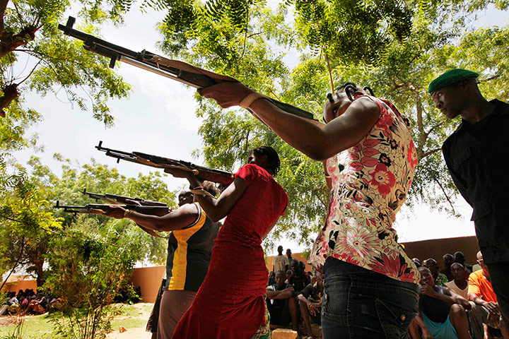 24 hours: Members of a self-defense militia train northeast of the capital Bamako