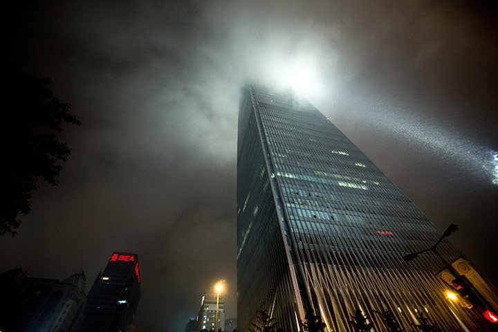 Beijing flooding: The China World Trade Center Tower III is seen during heavy rainfall 