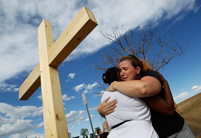 24 hours in pictures: memorial for victims in Aurora