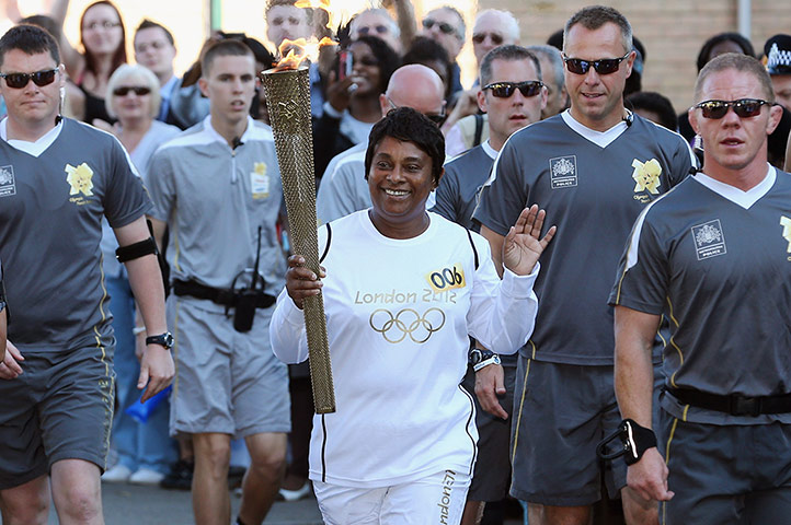 Picture Desk Live: The Olympic Torch Continues It's Journey Around London
