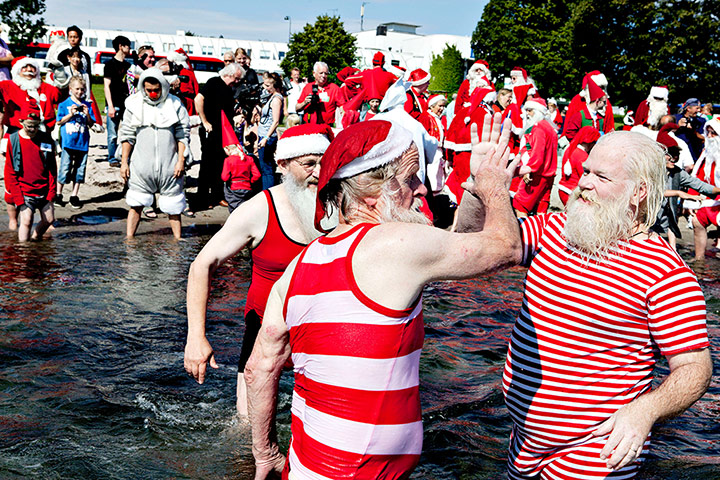 Picture Desk Live: Santas from all parts of the world take