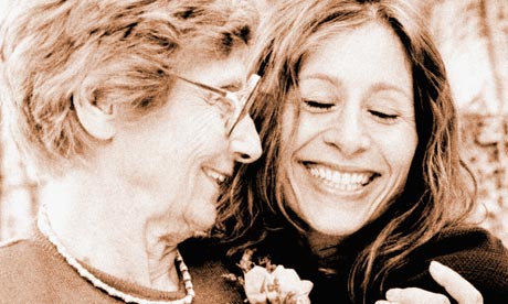 Older woman smiling with daughter