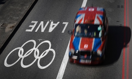 A taxi passes alongside one of the official Olympic Lanes on a street in central London on 23 July 2012. Photograph: Ben Curtis/AP