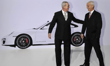 Martin Winterkorn and Matthias Mueller at an annual meeting of the Porsche Automobil Holding SE