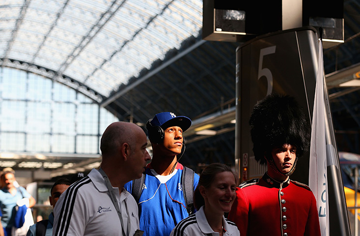 24 hours in pictures:  Boxer Tony Yoka of France arrives at St.Pancras International Station