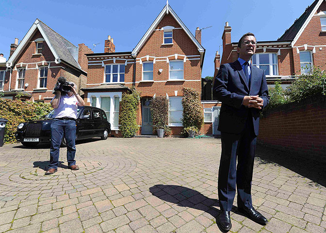 Picture desk live: Andy Coulson makes a statement to the press at his home in Dulwich, London
