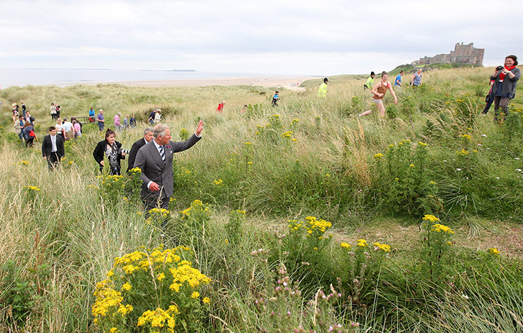 Picture desk live: Prince Charles on a visit to the beach at Bamburgh 