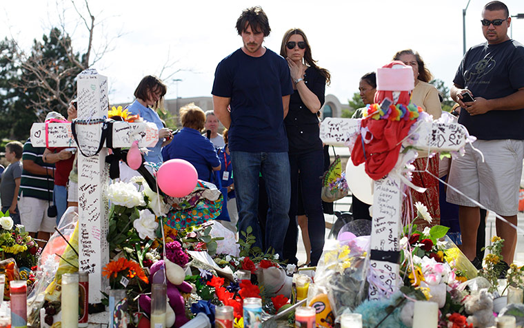 Picture desk live: Christian Bale visits Aurora, Colorado