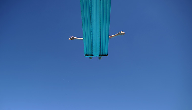 24 hours: Hanover, Germany: A boy prepares to jump Freibad Lister Bad swimming pool 