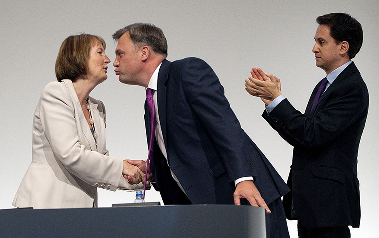 Politicians kiss: Harriet Harman, Ed Balls and Ed Miliband, Labour party conference, 2011