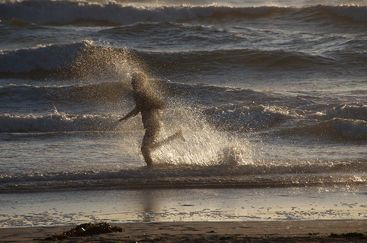 Your Pictures: Run: A figure of a person running in the sea