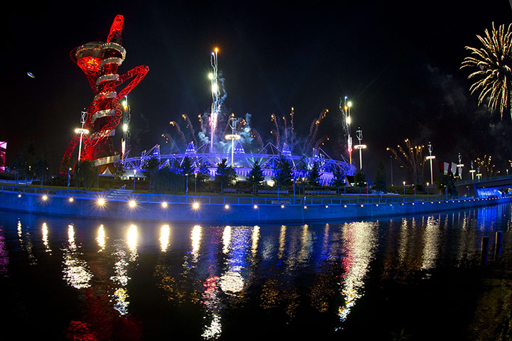 Picture desk live: Fireworks explode over the Olympic stadium