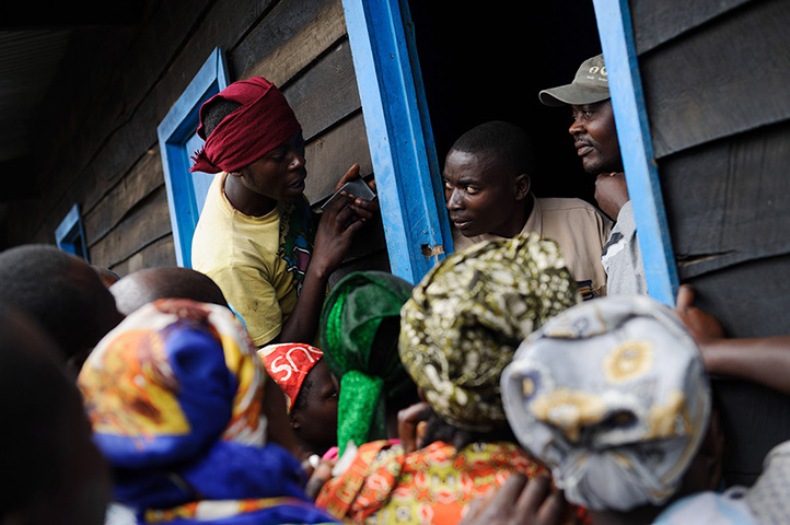 24 hours: Kibati, Democratic Republic of the Congo: People queue to register
