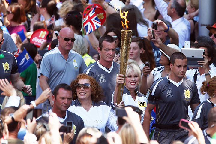 Picture desk live: Joanna Lumley and Jennifer Saunders carry the Olympic torch