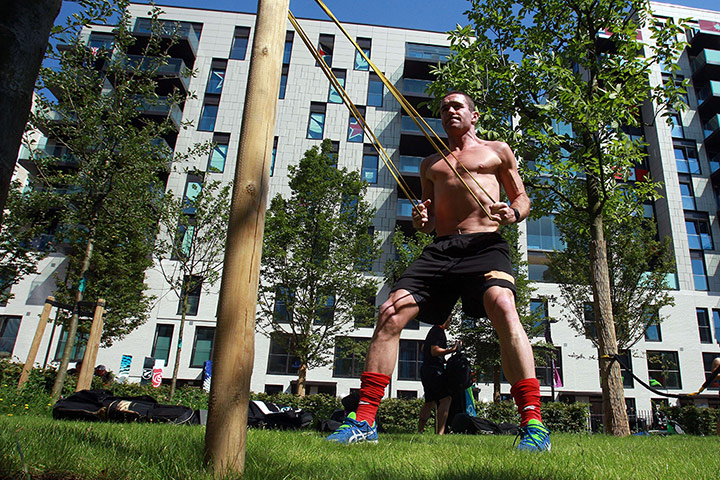 Athlete's final day: An athlete works out at the Olympic Village