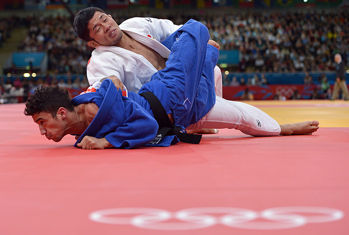 Team GB: Great Britain's Ashley McKenzie takes on Japan's Hiroaki Hiraoka