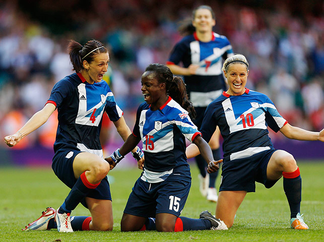 Team GB: Jill Scott, left, celebrates with Eniolo Aluko, centre and Kelly Smith