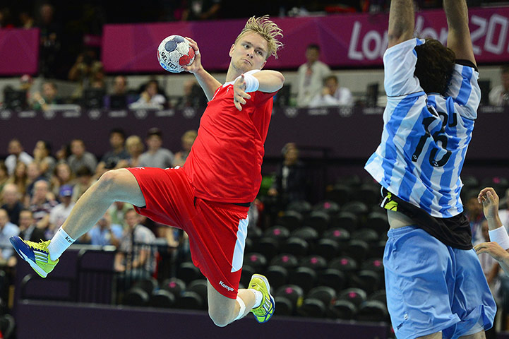 Olympics seating: Empty seats are seen behind Iceland's centreback Aron Palmarsson