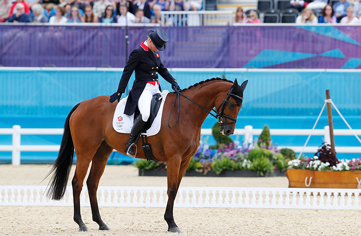 Zara Phillips: Zara Phillips salutes after completing the dressage event on day two