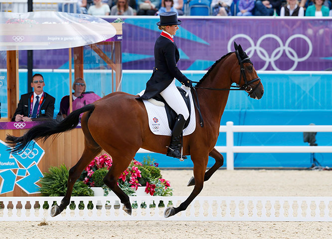 Zara Phillips: Zara Phillips rides past the judges