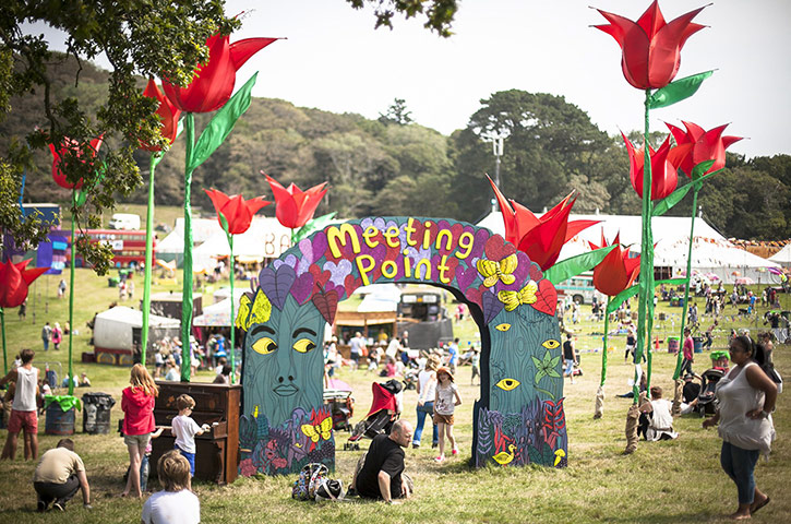 Camp Bestival: Larger than life tulips act as flags to a meeting point