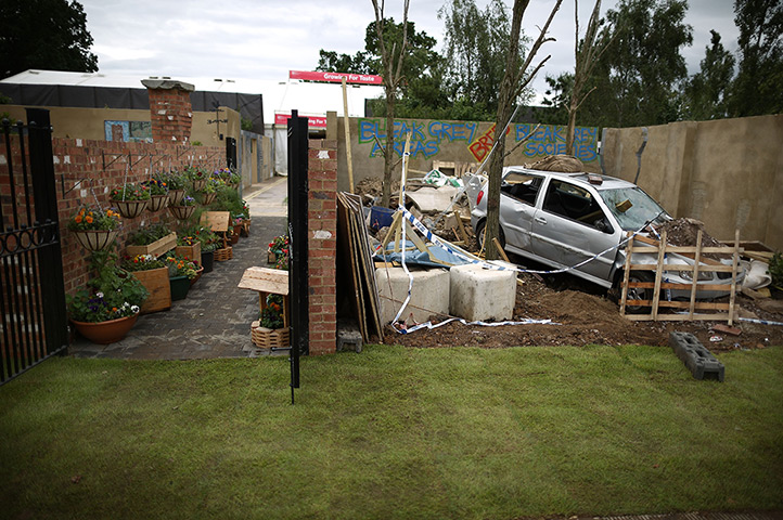 Hampton Court flower show: A wrecked car in the Chris Beardshaw designed Urban Oasis gardens