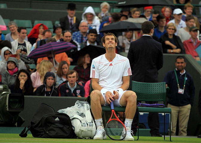 Picture desk live: Andy Murray takes a rain check during his match with Croatia's Marin Cilic