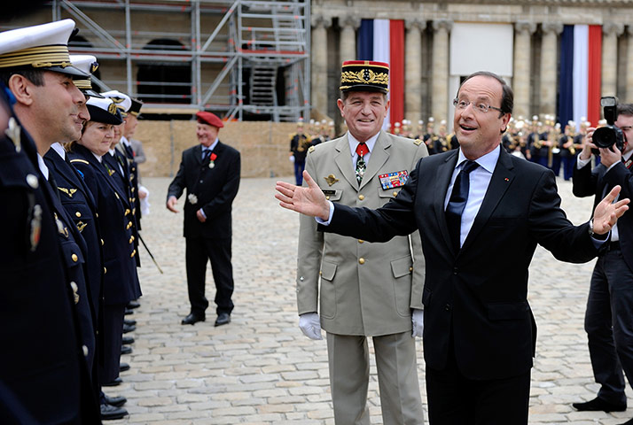 Picture desk live: Francois Hollande at a military ceremony at the Hotel des Invalides