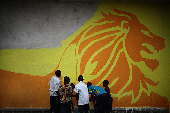 War Child: Mural painting project with local street children in Goma, DRC