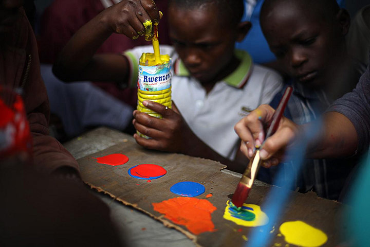 War Child: Mural painting project with local street children in Goma, DRC