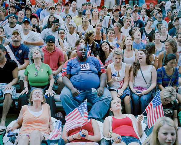 Foto8 Summershow : A crowd sits in temporary stands, New York