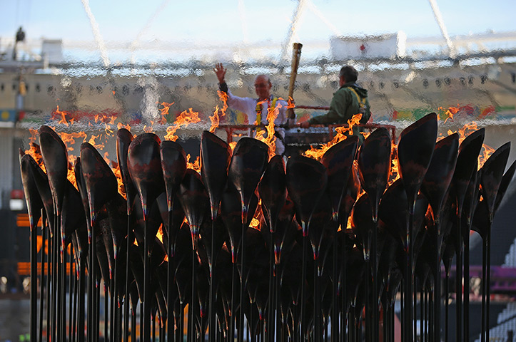 Olympic cauldron: The copper petals lit Olympic Flame is Repositioned