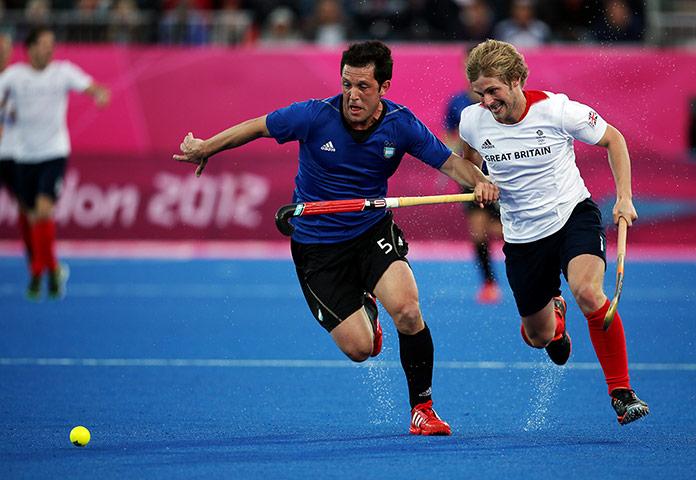Hockey: Argentina's Pedro Ibarra in action against Great Britain's Ashley Jackson