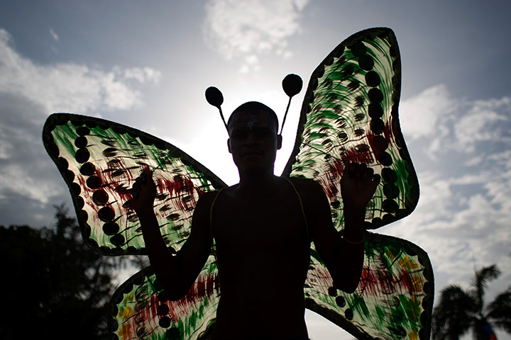 Carnival of flowers: A reveller wearing butterfly-like wings 