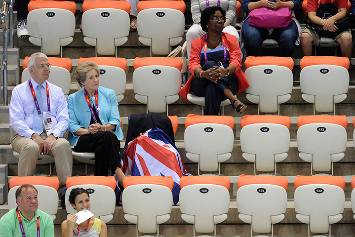 Olympic empty seats : ohn Major and his wife Norma watch the men's synchronised 10m