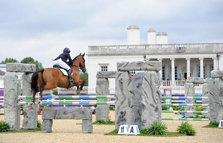 Equestrian jumping: Mary King clears the Stonehenge jump on Imperial Cavalier