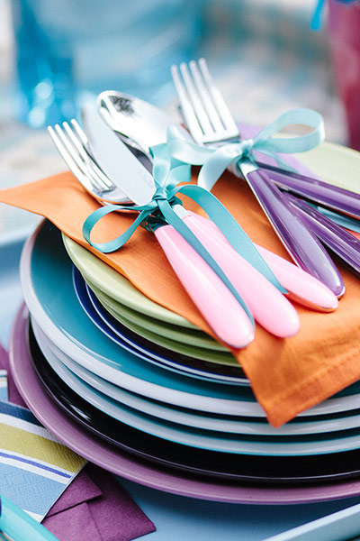 Brita - Table decorations: Cutlery tied together with bright ribbon
