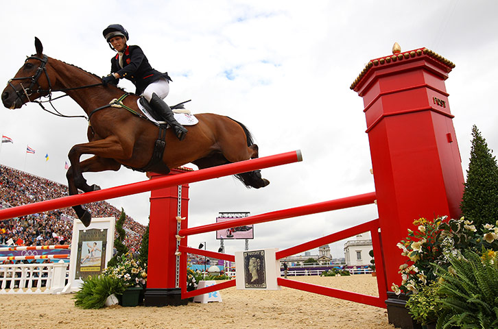 Jumps in Greenwich Park: Zara Phillips on High Kingdom knocks a rail off the Post Office fence