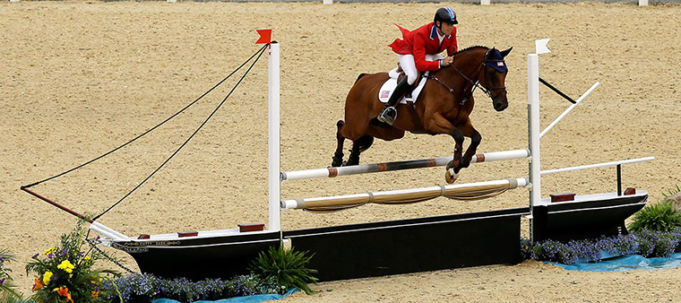 Jumps in Greenwich Park: William Coleman rides Twizzel over a ship shaped fence