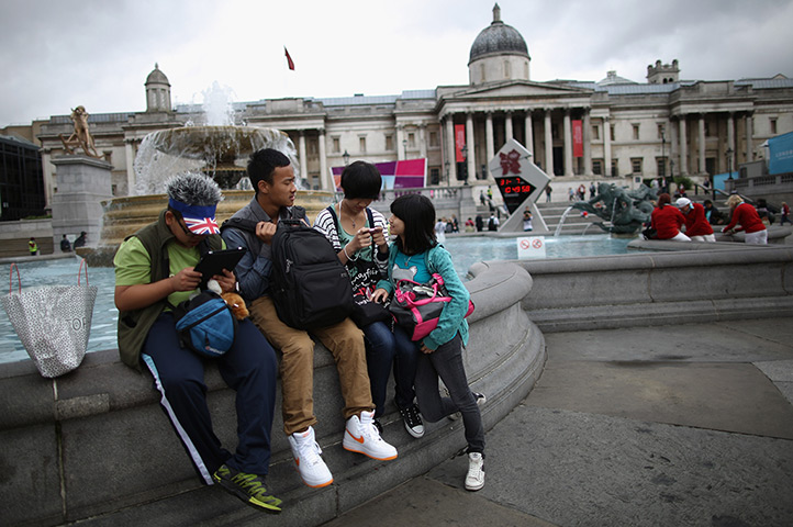 Quiet London: Tourists gather in Trafalgar Square