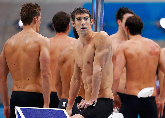 phelps gallery: Michael Phelps looks down at the pool