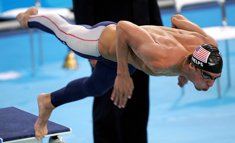 phelps gallery: Michael Phelps cwins anpother gold in the 100m butterfly final in 2004.