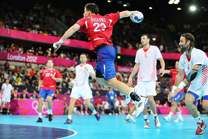 David Levene handball: A Serbian player goes for a shot on goal